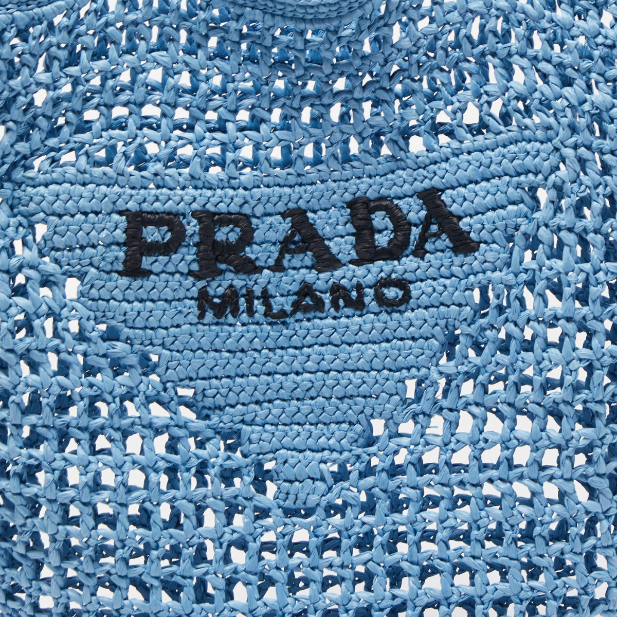 BORSA SHOPPER PRADA IN RAFIA CON LOGO INTRECCIATO – BLU