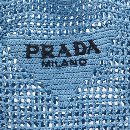 BORSA SHOPPER PRADA IN RAFIA CON LOGO INTRECCIATO – BLU